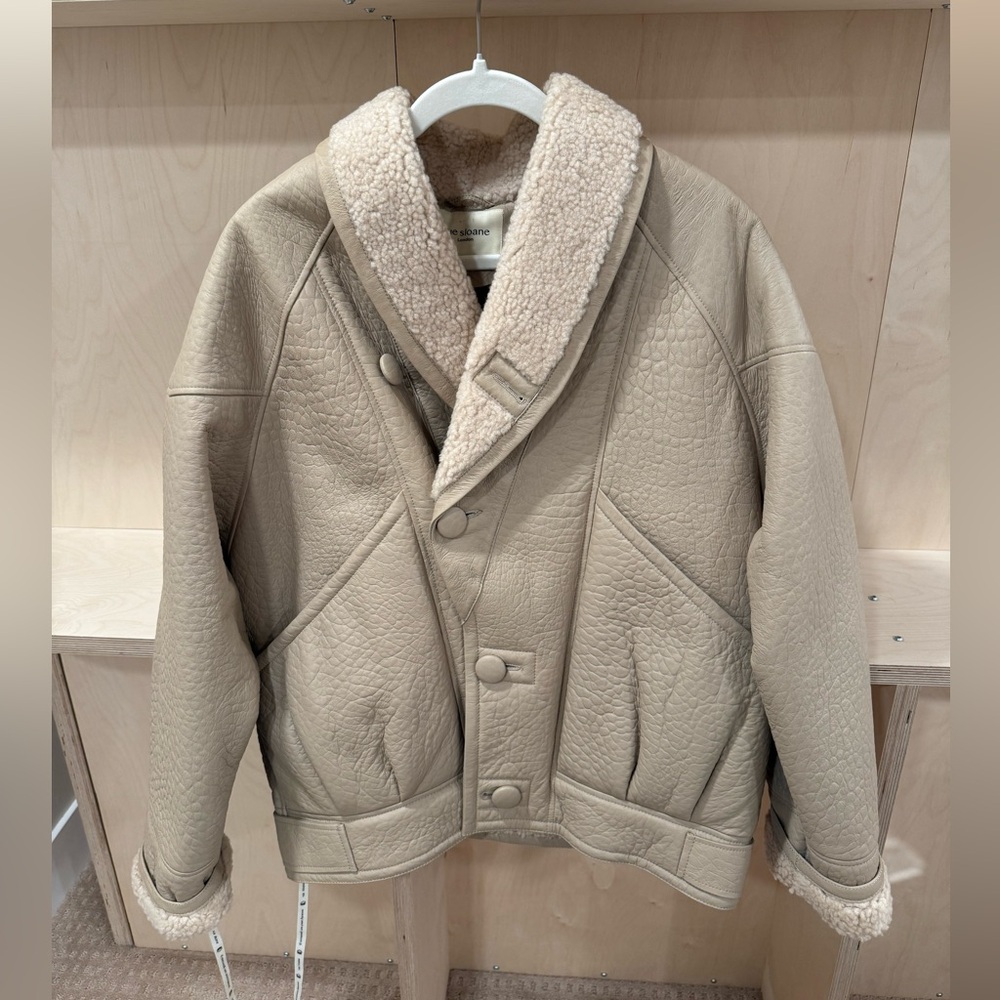 Beige leather bomber jacket by Rue Sloane